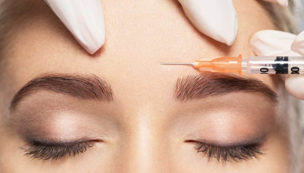 woman receiving botox injection